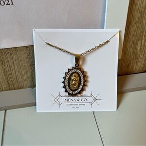 Stainless Steels Gold Virgen de Guadalupe Pendant Necklace with silver accents.